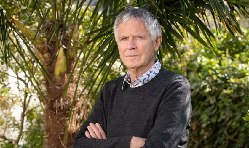 Patron of migrants and former CEO of Materis, a branch of building materials group Lafarge, Olivier Legrain, poses in his garden in Neuilly-sur-Seine, west of Paris, on April 28, 2021. Millionaire Olivier Legrain has used his fortune to aid migrants through his endowment fund he founded in 2019 Riace France, in which he injected 3 million euros. (Photo by GEOFFROY VAN DER HASSELT / AFP)