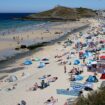 A general view of Porthmeor Beach during hot weather in St Ives, Cornwall, Britain, August 7, 2022. REUTERS/Tom Nicholson