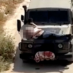 The Palestinian man strapped to the front of the car. Pic: Reuters