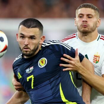 Scotland's John McGinn in action with Hungary's Marton Dardai. Pic: Reuters