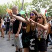 Protesters shoot water from water guns at tourists during a protest against mass tourism in Barcelona, Spain, July 6, 2024. The Catalan capital received more than 12 million tourists in 2023 and expects more in 2024. REUTERS/Bruna Casas