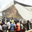 People and rescuers gather at the scene of a collapsed two-storey building in Jos, Nigeria. Pic: AP