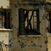 The holes from bullets are seen on an abandoned building inside the war-torn U.N. buffer zone in divided capital, Nicosia, Cyprus, Thursday, June 6, 2024. Fifty years after war cleaved Cyprus along ethnic lines, tensions are rekindling along the 180-kilometer-long buffer zone separating Turkish Cypriots from Greek Cypriots. It's another potential source of instability in an already tumultuous region. (AP Photo/Petros Karadjias)