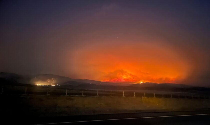 Wildfires threaten communities in the West as Oregon fire closes interstate, creates its own weather