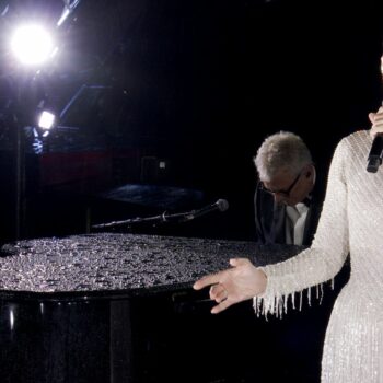 Celine Dion performs at the Eiffel Tower. Pic: Olympic Broadcasting Services via AP