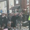 rouble flares during a protest in Southport, after three children died and eight were injured in a "ferocious" knife attack during a Taylor Swift event at a dance school on Monday. A 17-year-old male from Banks, Lancashire, has been arrested on suspicion of murder and attempted murder over the incident. Picture date: Wednesday July 31, 2024.