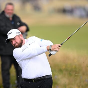 At British Open, a mighty wind shoos Rory McIlroy and kisses Shane Lowry