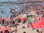 Brits bask in temperatures of 32C in hottest day of the year so far as Met Office issues official heatwave warning - but storms are on the way within hours