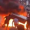 Leeds is burning! Police beg residents to stay at home whilst they battle to disperse crowds of rioters who have turned over cop cars, intimated officers and set fire to a double decker bus