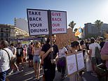 'The only thing coming home is you': Anti-tourist protesters in Majorca mock England's Euro 2024 loss to Spain as THOUSANDS take to the streets to demand Britain 'takes back its drunks'