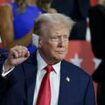 Trump gets a hero's welcome at the Republican convention: Former president greets cheering fans with a bandage on his ear just two days after assassination attempt