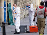 Woman arrested after Bath police hazmat incident which saw shoppers fall unwell and hosed down in the street during five-hour city centre lockdown - as police hold 73-year-old on suspicion of administering unknown noxious substance