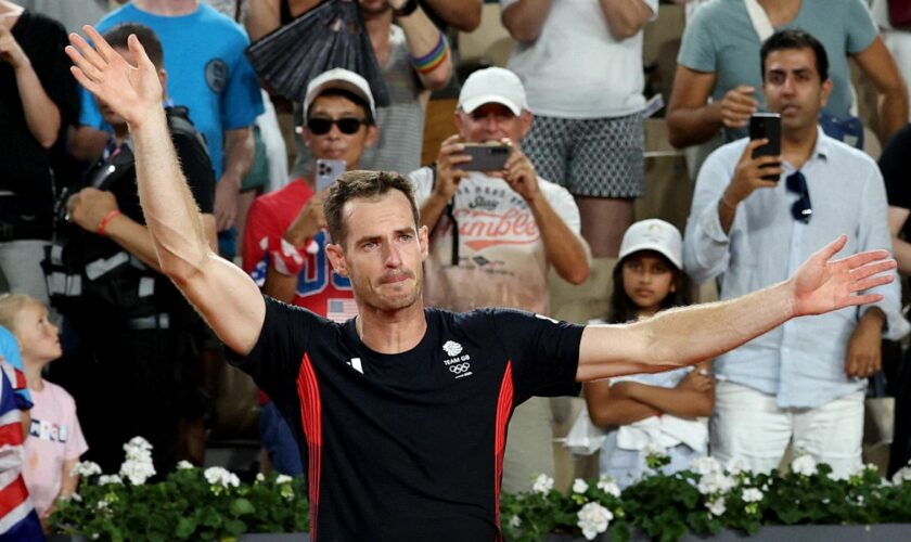 Andy Murray reacts after the last match of his tennis career. Pic: Reuters