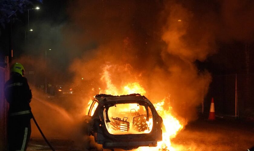 Boy, 11, arrested on suspicion of arson after police vehicle set alight in Hartlepool riot as seven charged