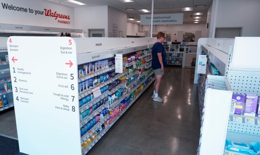 Drugstores tinker with new looks as their usual way of doing business faces challenges