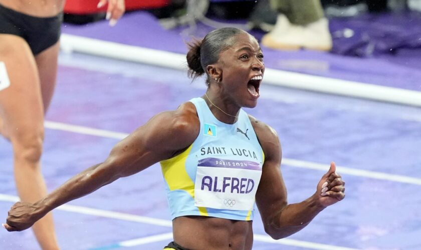 Julien Alfred, of Saint Lucia, celebrates after winning the women's 100 meters final at the 2024 Summer Olympics, Saturday, Aug. 3, 2024, in Saint-Denis, France. Pic: AP