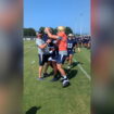 Navy football player finds out sister won Olympic gold while on pitch