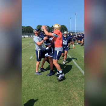 Navy football player finds out sister won Olympic gold while on pitch