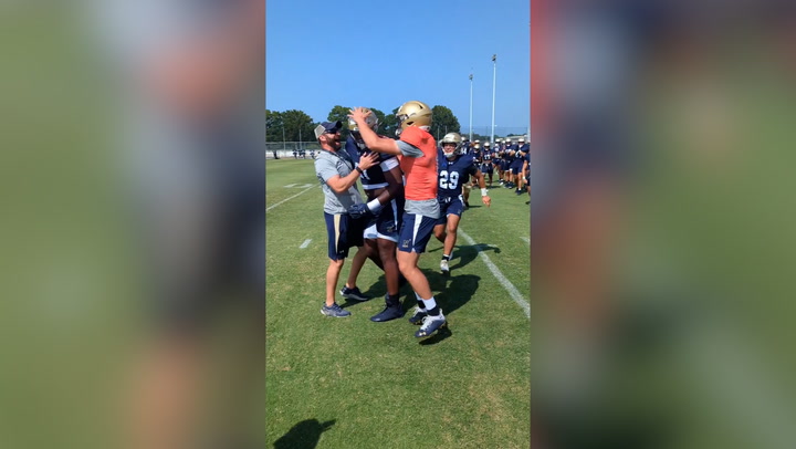 Navy football player finds out sister won Olympic gold while on pitch