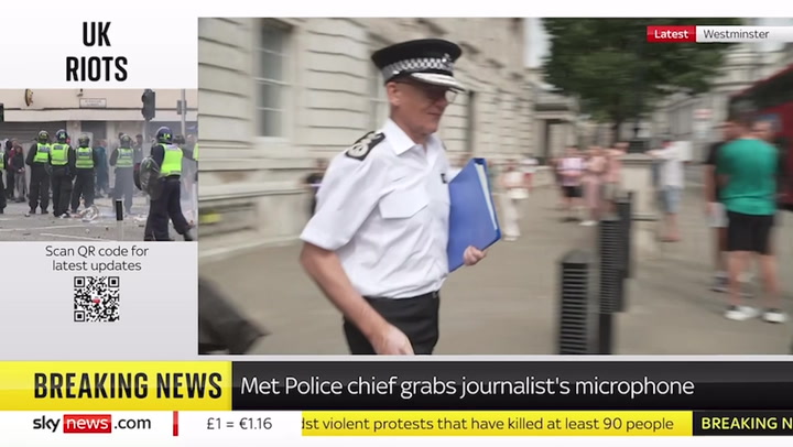 240805 Met Police Commissioner Bizarrely Removes Microphone Cover Off Photographer Outside Cabinet Office Sky News.mp4