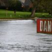 A "Danger" sign is seen on the River Thames, on the day data revealed sewage spills into England's rivers and seas by water companies more than doubled last year, in Hambledon, Britain, March 27, 2024. REUTERS/Dylan Martinez