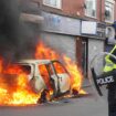 A car after it was set on fire by rioters in Middlesbrough on Sunday 4 August. Pic: PA