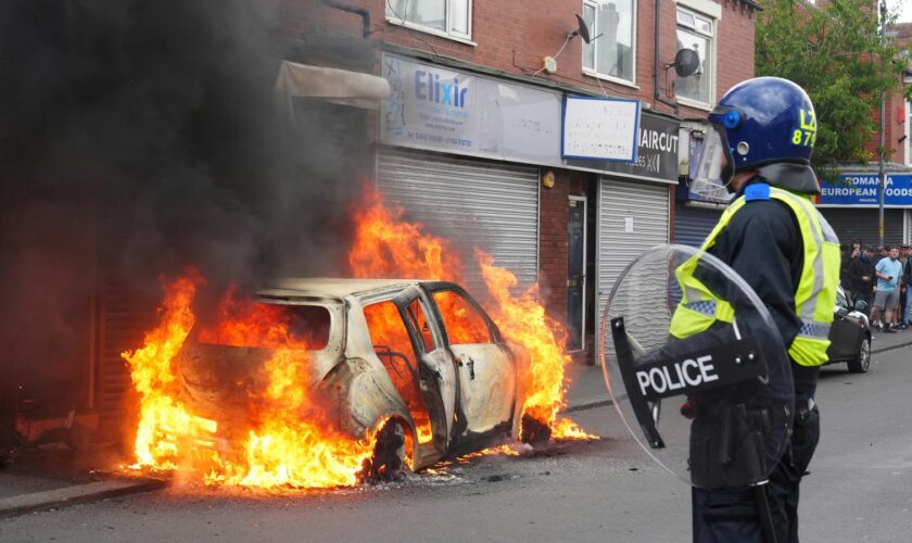 A car after it was set on fire by rioters in Middlesbrough on Sunday 4 August. Pic: PA