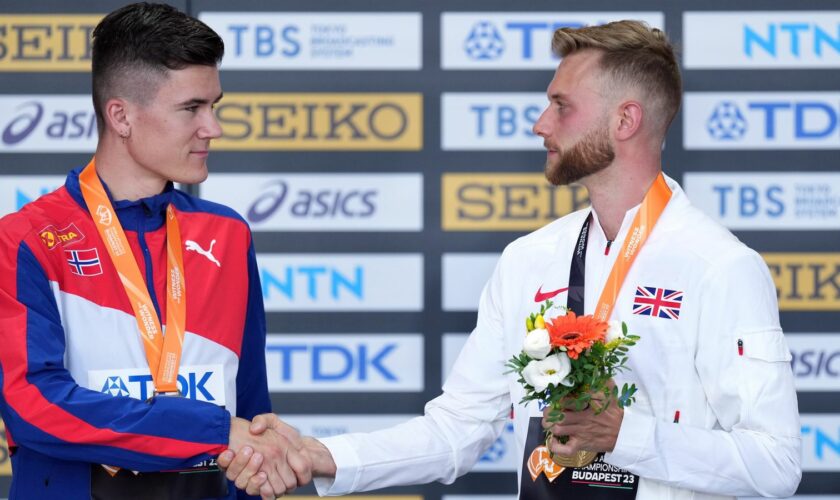 Great Britain's gold medalist Josh Kerr shakes hands with silver medalist Norway�s Jakob Ingebrigtsen during the medal ceremony for the Men's 1500 Metres on day seven of the World Athletics Championships at the National Athletics Centre in Budapest, Hungary. Picture date: Friday August 25, 2023.