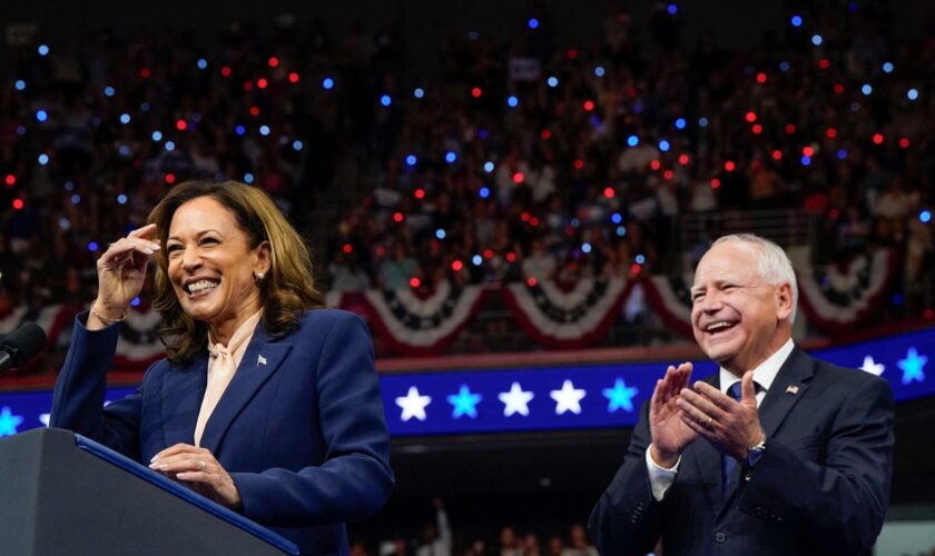 Kamala Harris and running mate Tim Walz take the stage at packed Philadelphia rally