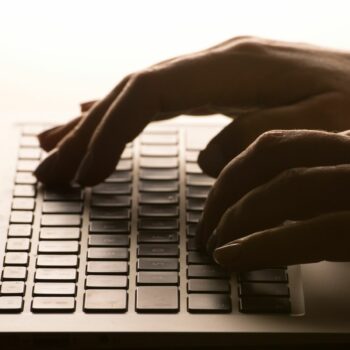 File photo dated 04/03/2017 of a woman's hands on a laptop keyboard. File pic: PA