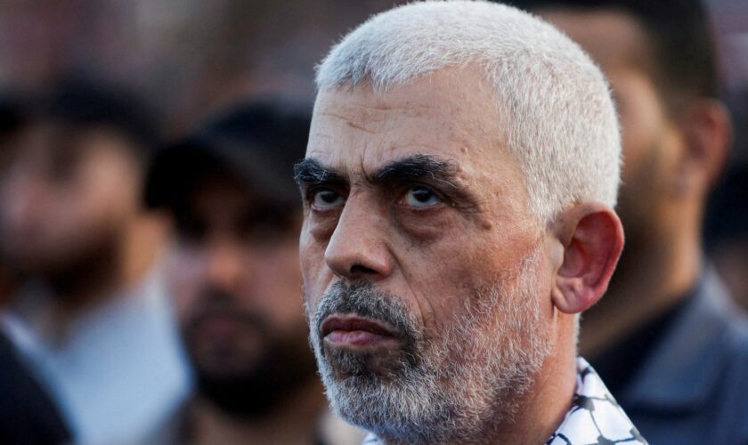 Hamas leader Yehya Al-Sinwar looks on as Hamas supporters take part in an anti-Israel rally over tension in Jerusalem's Al-Aqsa mosque, in Gaza City October 1, 2022. REUTERS/Mohammed Salem/