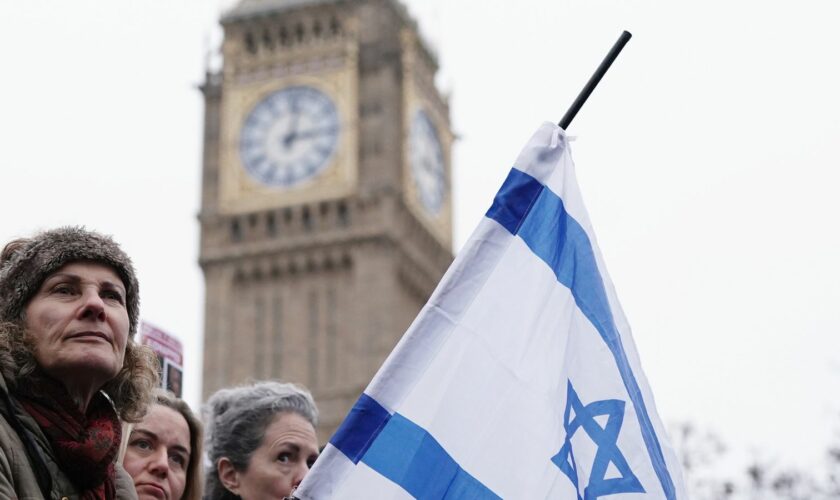 People take part in a march against antisemitism organised by the volunteer-led charity Campaign Against Antisemitism in Westminster, central London. Picture date: Sunday November 26, 2023.