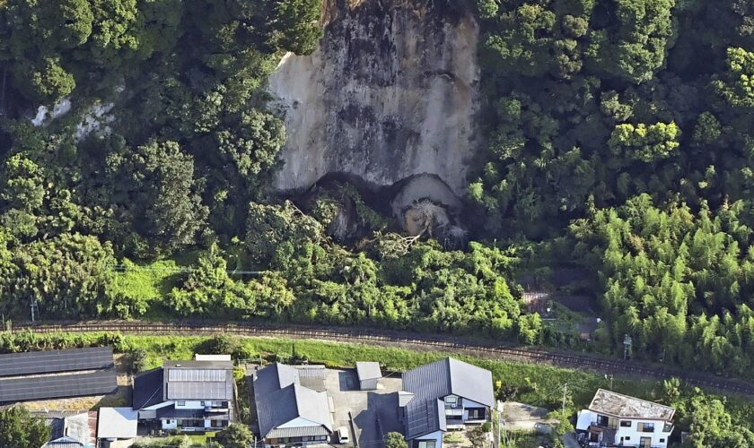 This aerial photo shows the site of a landslide in Shibushi, Kagoshima prefecture, southern Japan  following Thursday's powerful earthquake. (Kyodo News via AP)