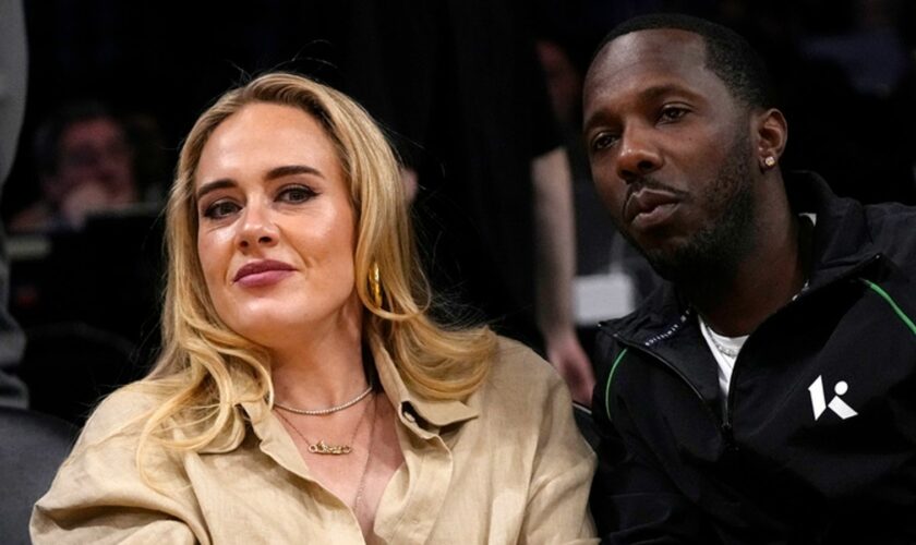 Singer Adele, left, sits with sports agent Rich Paul during the second half in Game 3 of an NBA basketball Western Conference semifinal between the Los Angeles Lakers and the Golden State Warriors Saturday, May 6, 2023, in Los Angeles. (AP Photo/Mark J. Terrill)