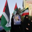 People in Tehran hold Palestinian flags as they attend an anti-Israel gathering following the killing of Hamas's leader Ismail Haniyeh. Pic: Reuters