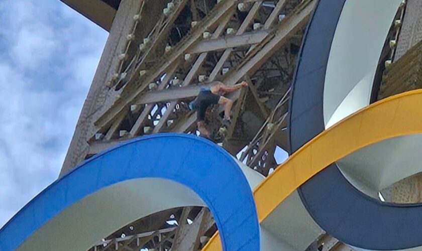 Eiffel Tower evacuated after man seen climbing hours before Olympics closing ceremony