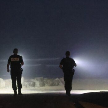 Police officers in France looking for migrant activity on 11 August