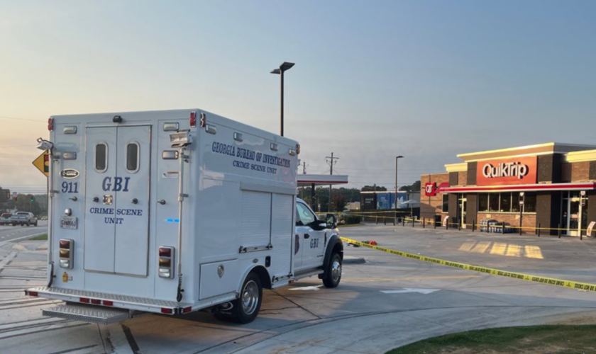 Georgia police fatally shoot man waving machine gun around near gas station