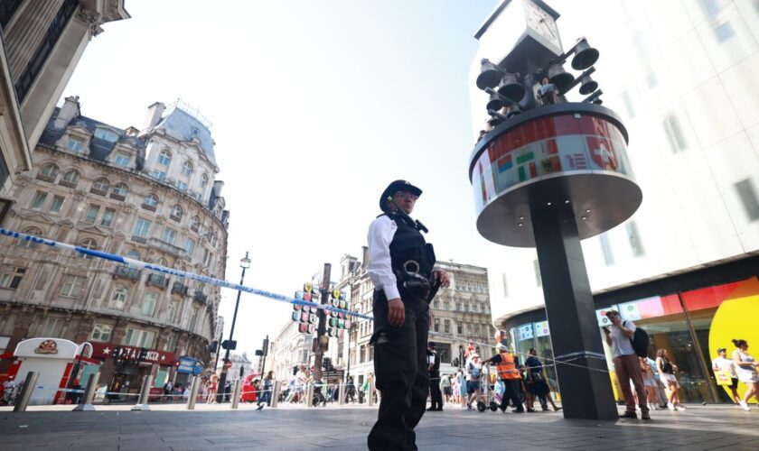 Girl, 11, and woman stabbed in Leicester Square as man arrested