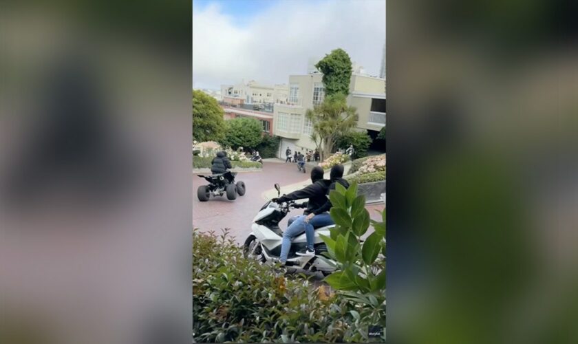 WATCH: San Francisco traffic officer circled by masked motorcyclists in tourist area