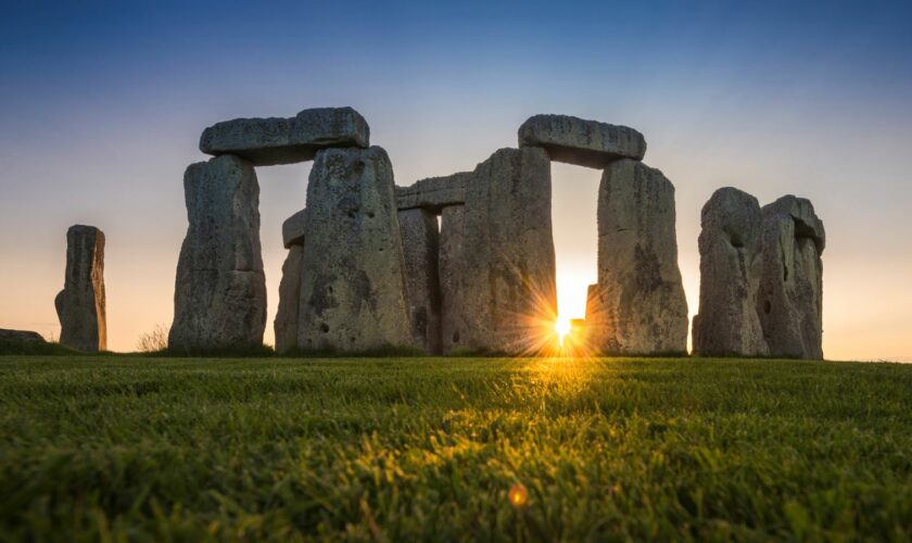 General view of the Stonehenge stone circle during the sunset, near Amesbury, Britain, as seen in this undated image provided to Reuters on July 29, 2020. English Heritage/A.Pattenden/Handout via REUTERS ATTENTION EDITORS - THIS IMAGE HAS BEEN SUPPLIED BY A THIRD PARTY.