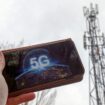 A 5G phone next to a telecoms mast near Wokingham, Berkshire. Pic: PA