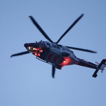 A Coastguard helicopter flies over St Thomas' Hospital in Westminster, London, to salute local heroes during Thursday's nationwide Clap for Carers NHS initiative to applaud NHS workers fighting the coronavirus pandemic.