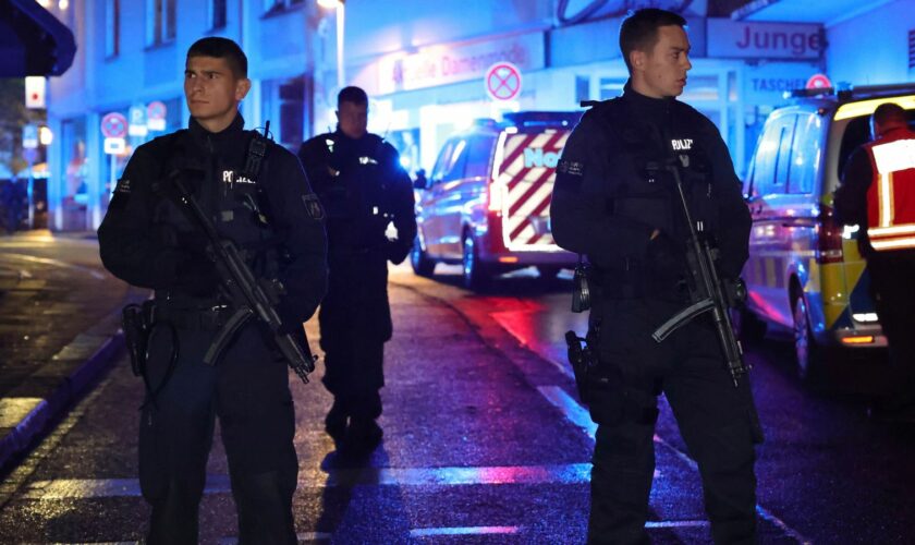 Armed police and ambulances gather in Solingen, Germany. (Pic: AP)