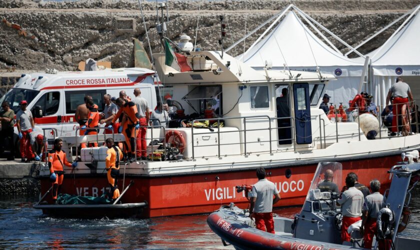 Rescue personnel transport what is believed to be the body of Hannah Lynch, daughter of British tech entrepreneur Mike Lynch, at the scene where a luxury yacht sank, off the coast of Porticello, near the Sicilian city of Palermo, Italy, August 23, 2024. REUTERS/Louiza Vradi