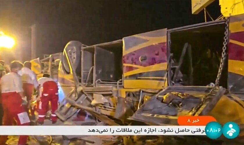 This image taken from a video released by Iranian state television shows the aftermath of a bus crash near Taft, Iran, early Wednesday, Aug. 21, 2024. A bus carrying Shiite pilgrims from Pakistan to Iraq crashed in central Iran, killing multiple people, an official said Wednesday. (Iranian state television via AP)