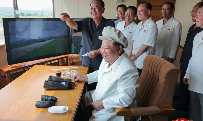 Kim Jong Un grins at 'successful testing of suicide drones'