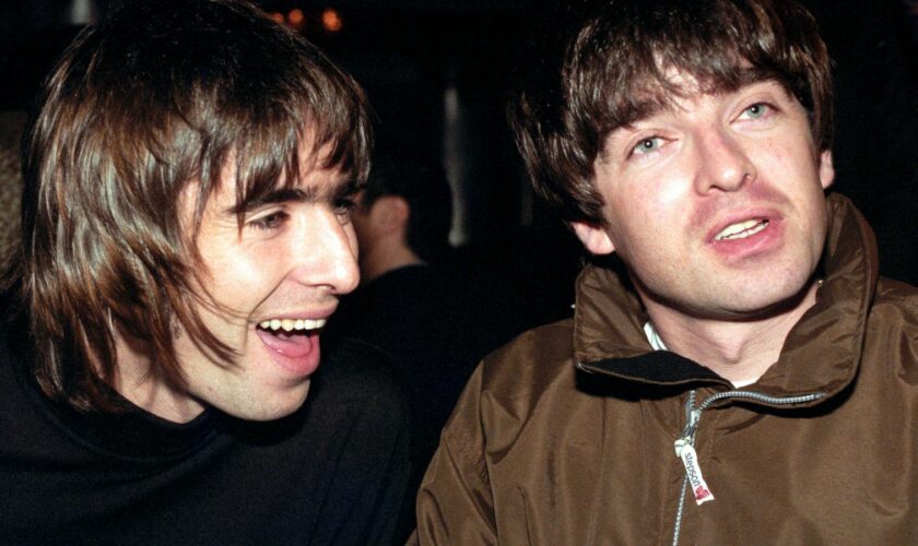 Oasis stars Liam and Noel Gallagher pictured at the Q Magazine music awards in London. Oasis frontman Liam received the Best Act in the World trophy on behalf of the band at the 10th anniversary of the awards.  * On 14.11.96 Oasis were announced as winners of the Best Group in the MTV Europe Awards, but failed to turn up for the event. See PA story SHOWBIZ MTV. Photo by Fiona Hanson/PA.