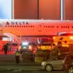 Multiple Atlanta Fire Rescue Department units and police park outside a Delta Maintenance facility near Hartsfield-Jackson International Airport early Tuesday, Aug. 27, 2024 in Atlanta. (John Spink/Atlanta Journal-Constitution via AP)