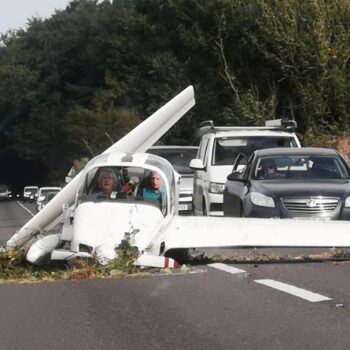 Two survive horror light aircraft crash as glider nosedives onto Cotswolds road